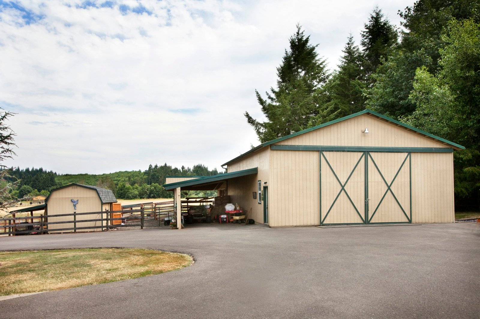 Concrete driveway and barn on ranch